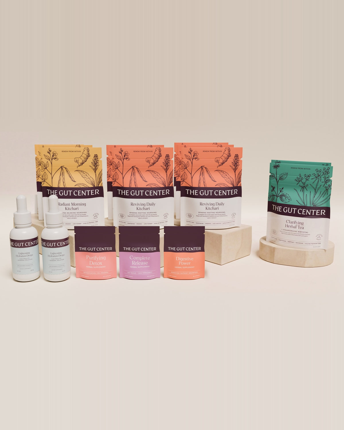 Renew Advanced cleanse set: Radiant Morning and Reviving Daily Kitchari pouches, Clarifying Herbal Tea, two Lightening Hydration Drops bottles, and Purifying Detox, Complete Release and Digestive Power pouches.