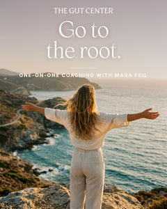 Go to the root. One-on-one coaching with Mara Feil. A woman with arms open above the sea at golden hour.