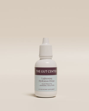 Lightening Hydration Drops 0.5 oz travel bottle from The Gut Center, front label: electrolyte and mineral solution.
