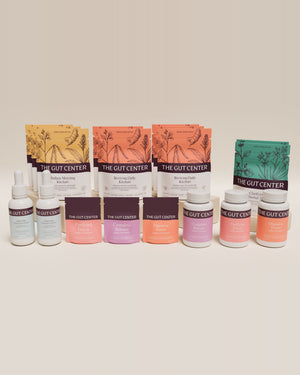 Renew Extended cleanse set with kitchari pouches, Clarifying Herbal Tea, two Lightening Hydration Drops bottles, and Purifying Detox, Complete Release and Digestive Power pouches and bottles.